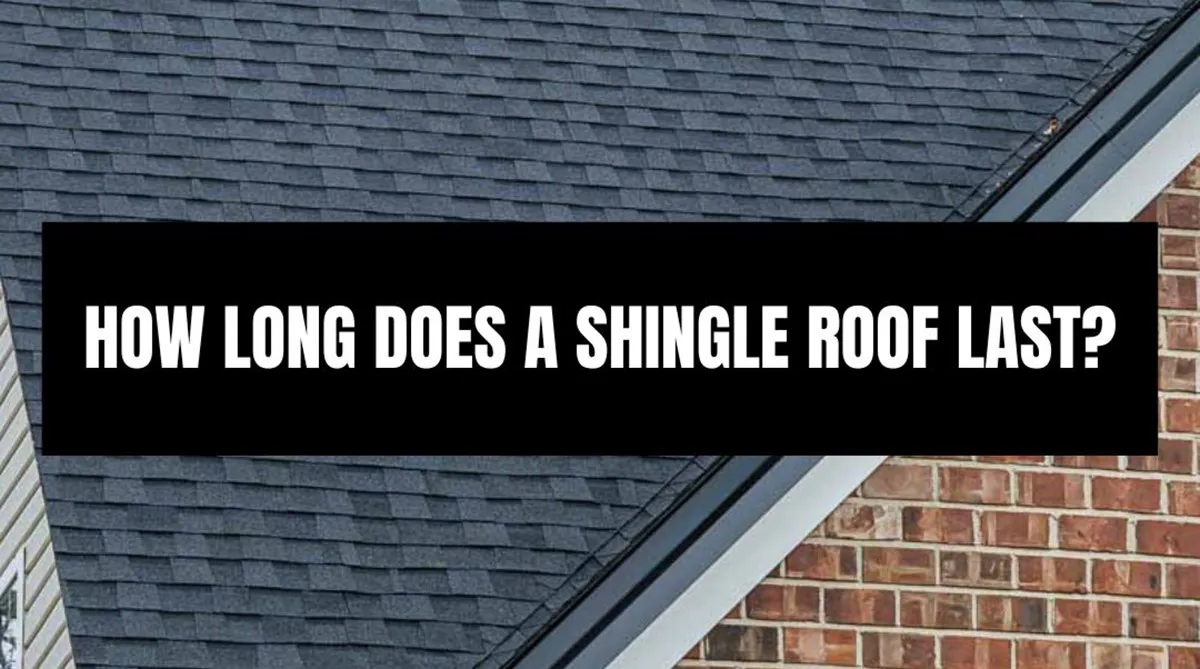 Dark asphalt shingle roof on a brick home with text overlay: How Long Does A Shingle Roof Last?