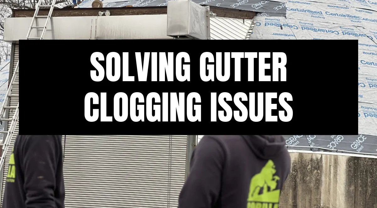 Two roofers in branded hoodies inspect a metal gutter installation with CertainTeed underlayment visible on roof.