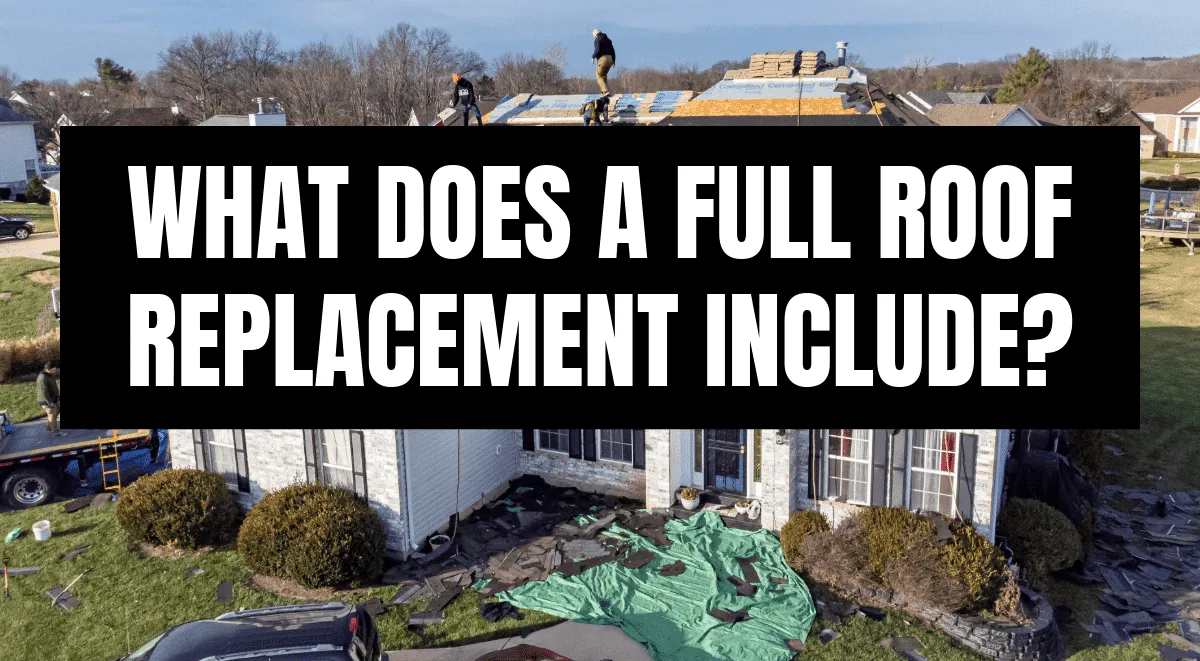 Aerial view of roof replacement in progress on St. Louis home with workers installing new shingles