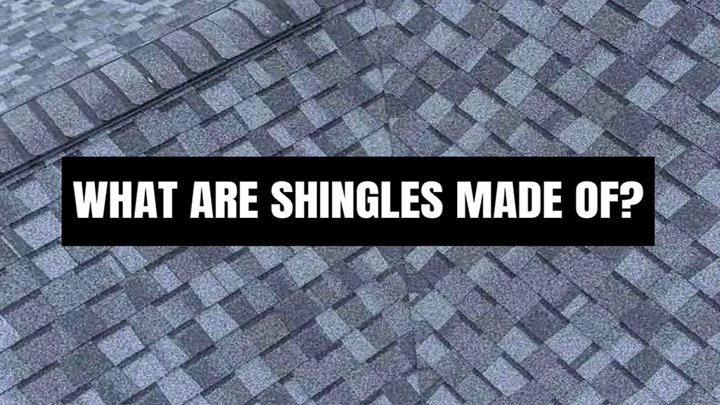 Close-up aerial view of gray asphalt shingle roof with text overlay reading 'What Are Shingles Made Of?'